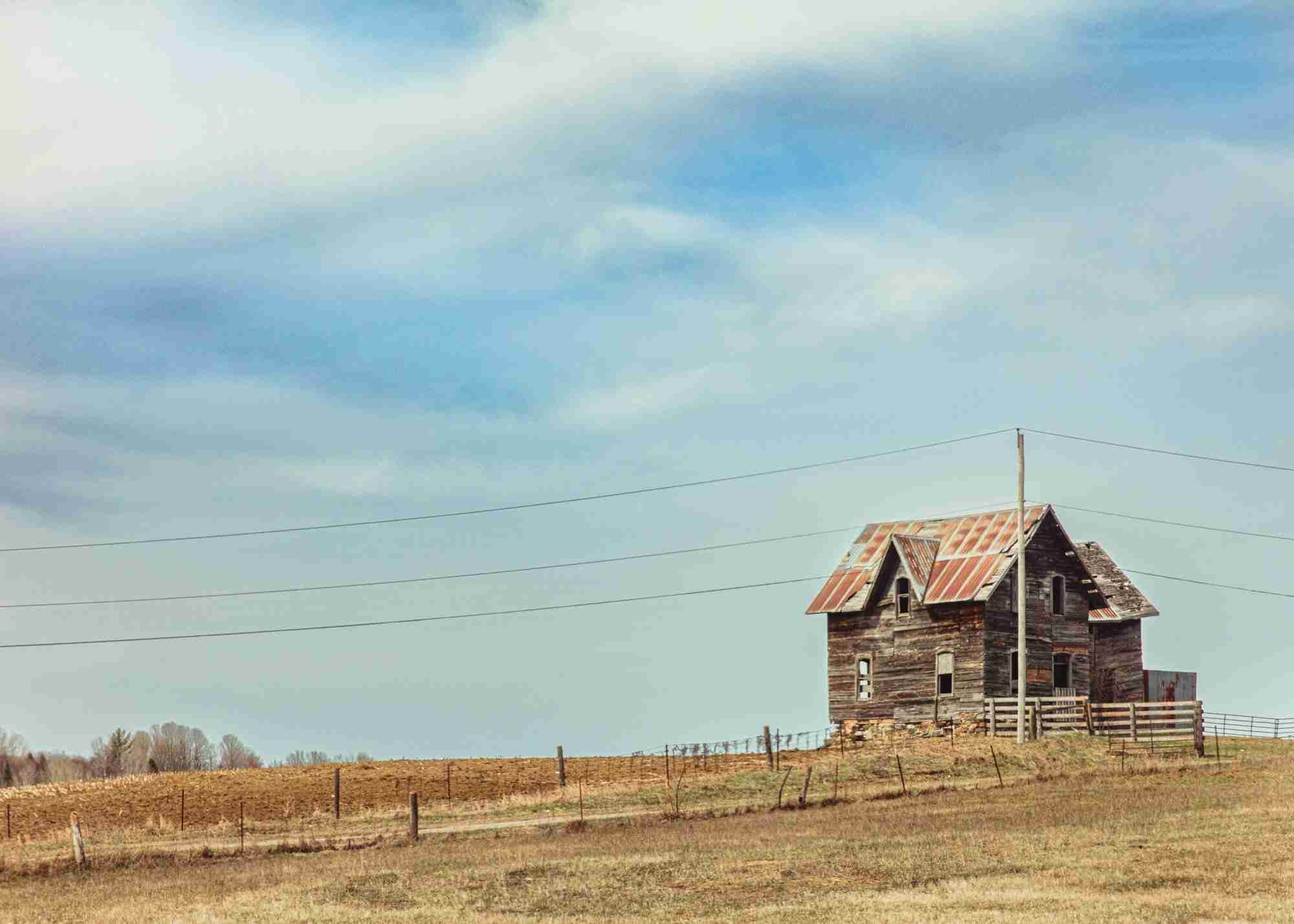 Abandoned Hillside Farmhouse